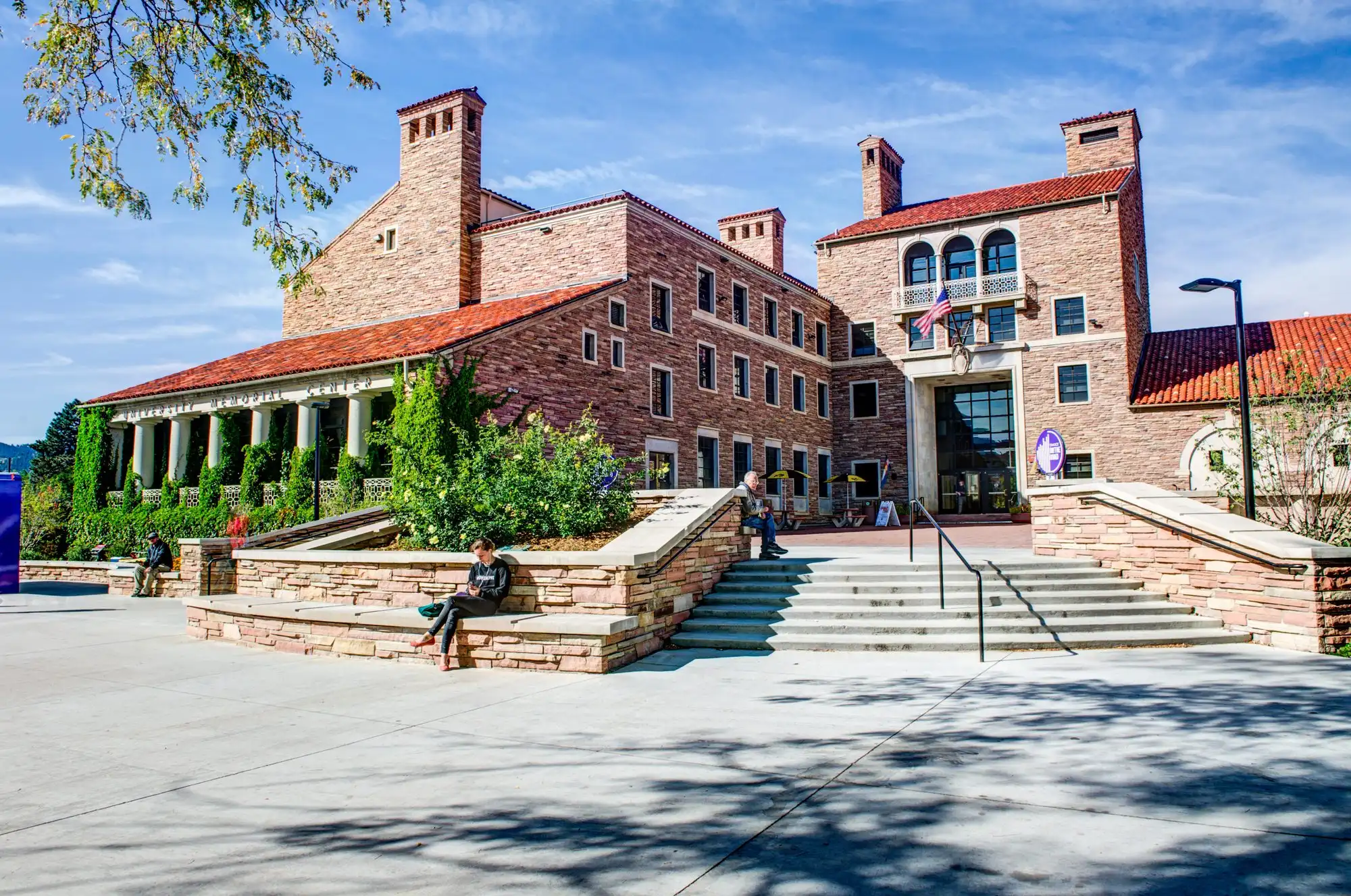 The CU Boulder campus framed by trees